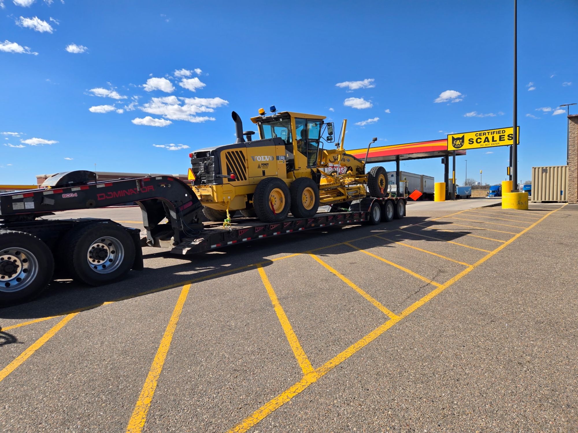construction equipment transportation services